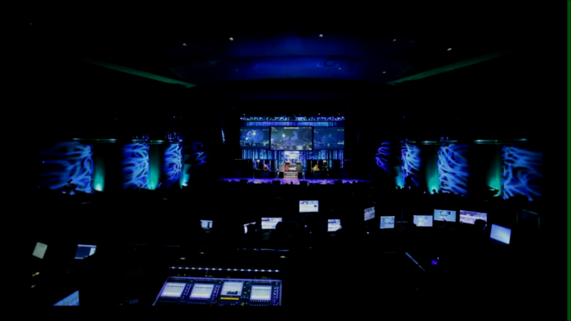 Wide view of an IPL3 gaming event stage and production monitors